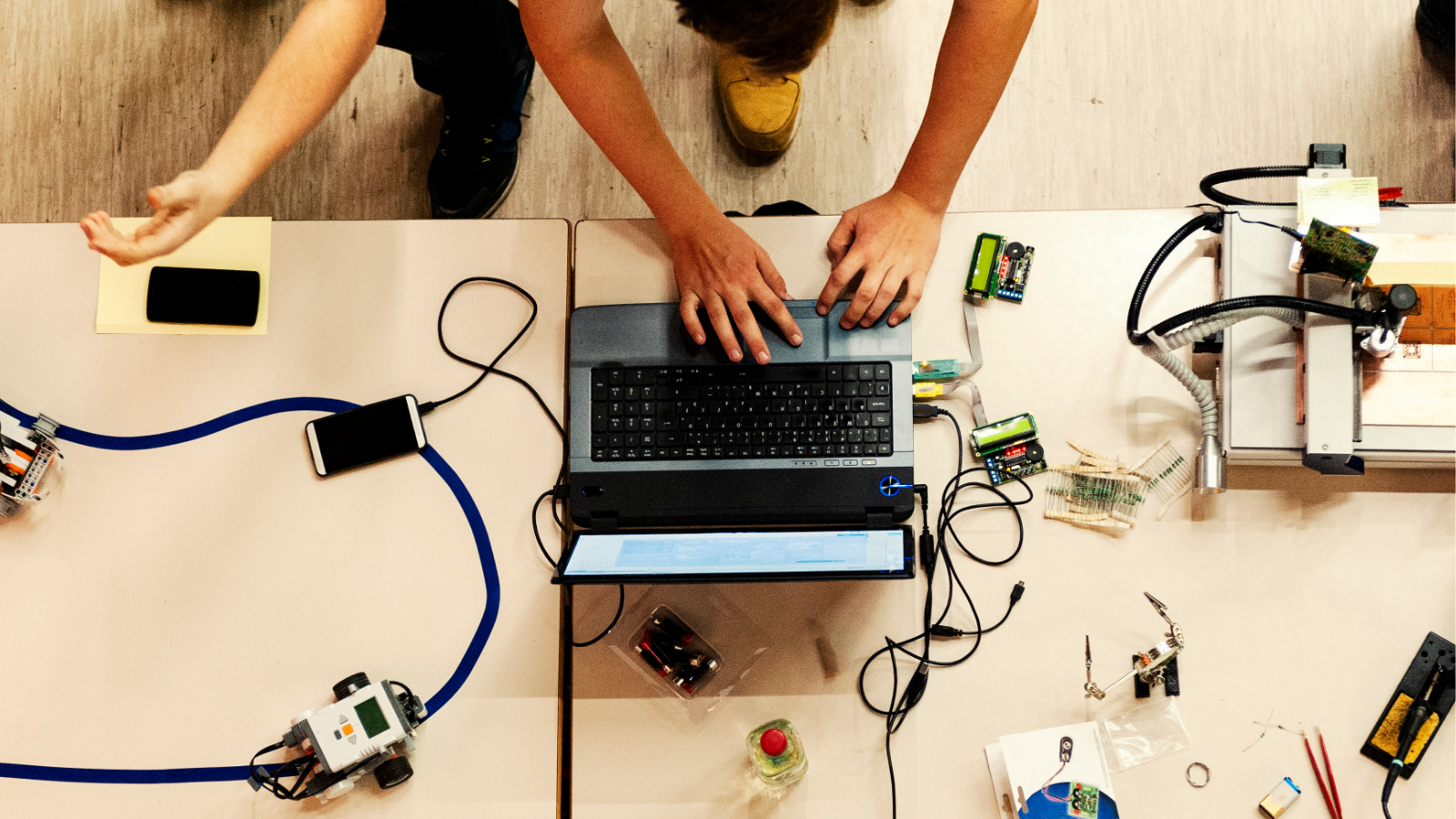 student hands with computer