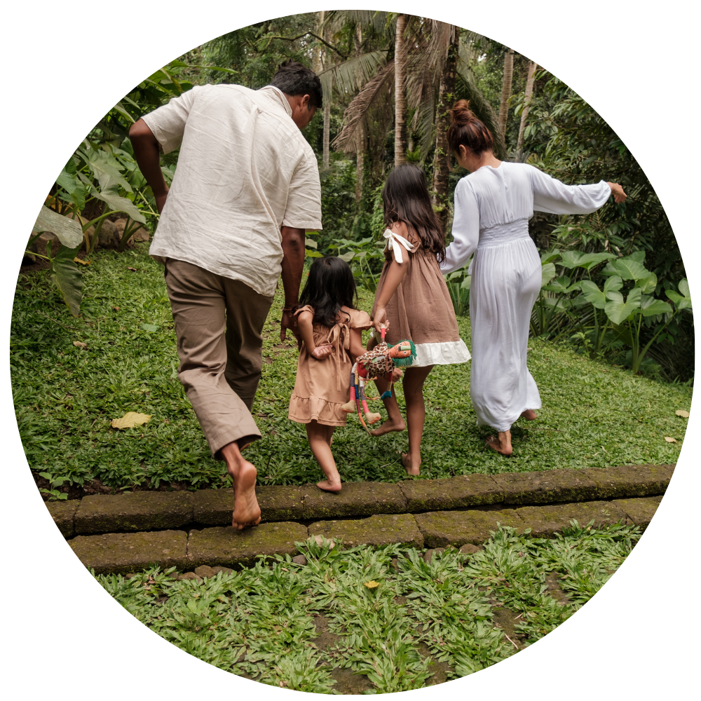 family walking in forest_photo credit Alena Shekhovtsova